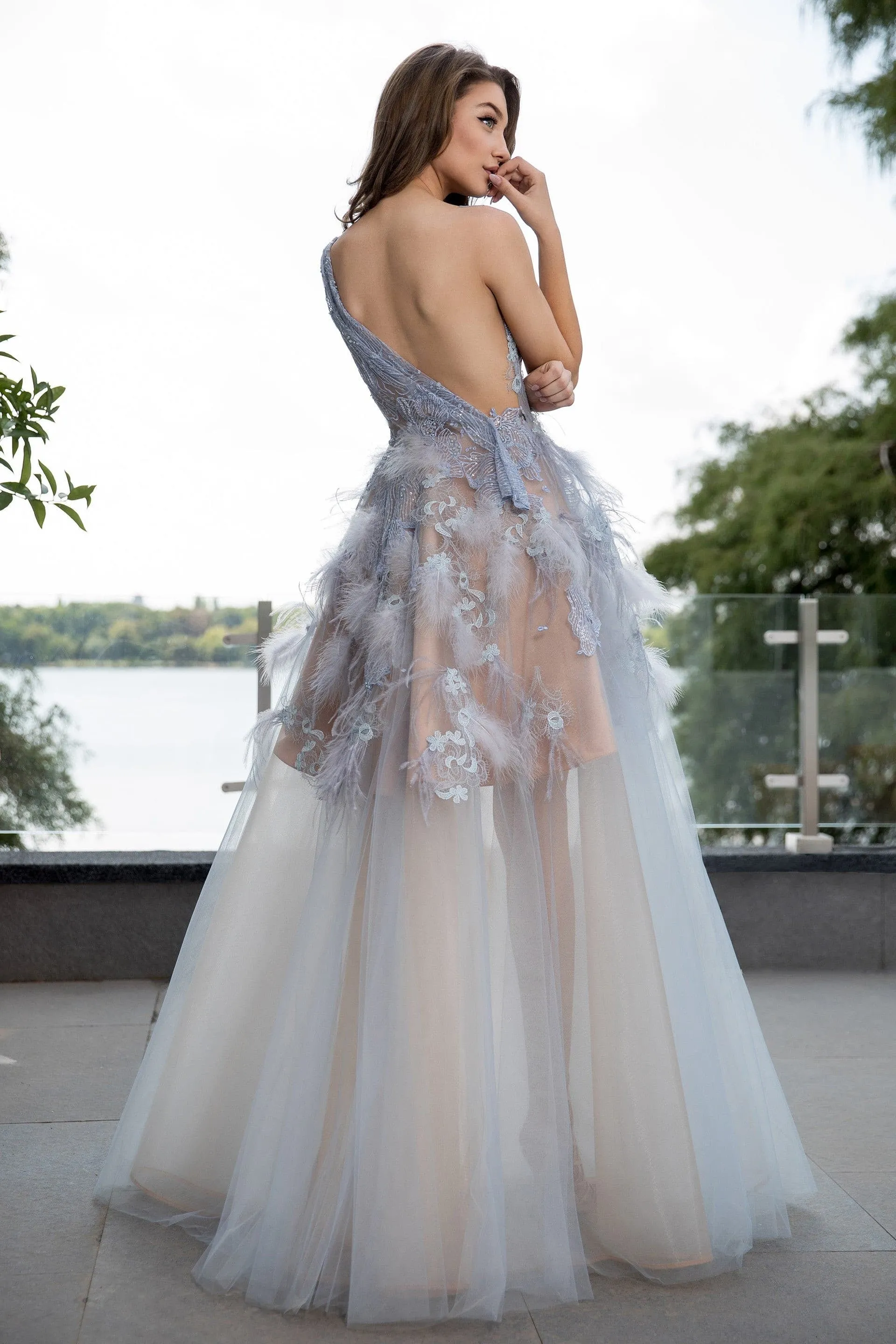 100% Italian polyamide tulle, pearls, beads and delicate handmade embroidery