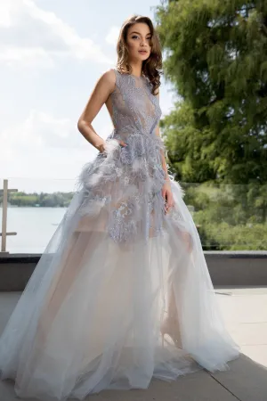 100% Italian polyamide tulle, pearls, beads and delicate handmade embroidery
